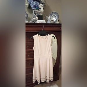 Calvin Klein size 4, fit and flare dress. Good condition beautiful peachy pink.